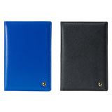 Stone Passport Wallet; blue at the left, black at the right.